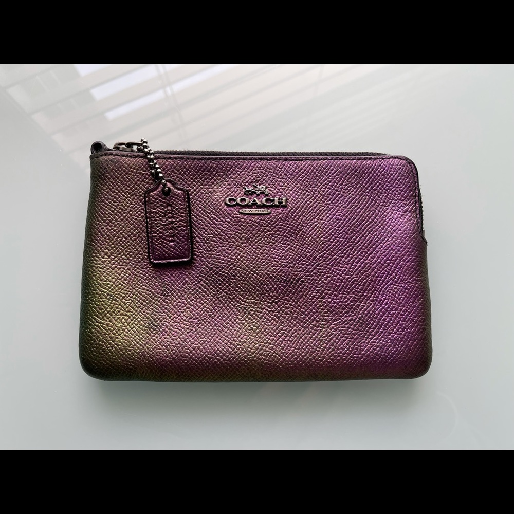 Coach leather wristlet pouch in iridescent finish.